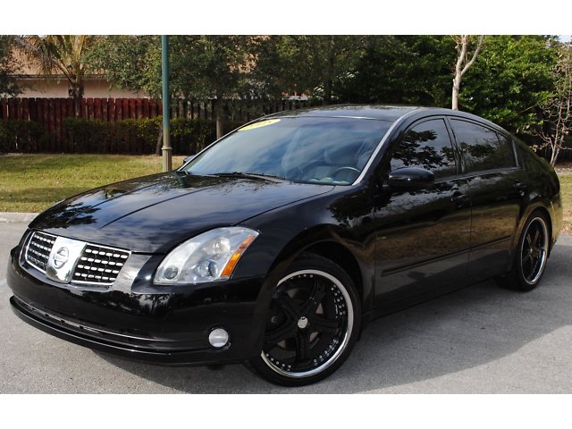 2005 Nissan maxima black rims